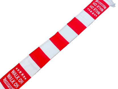 A red and white striped knit scarf with white fringe, featuring the text 'WALK ON WRESTLING' and 'WRESTLING WALK ON' on a dark wood floor background.