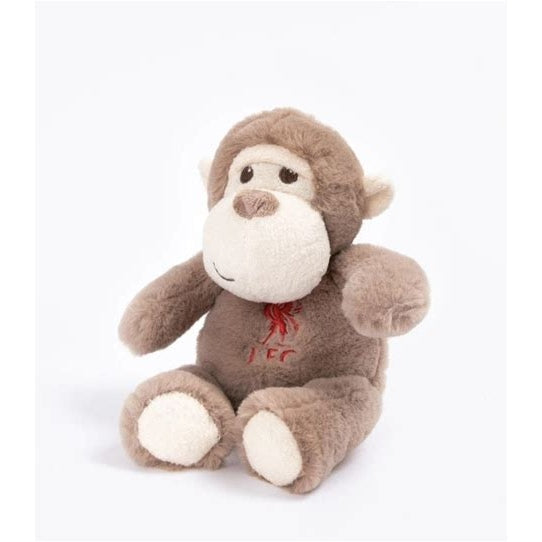 A plush toy monkey sitting down, made of brown and cream plush fabric with a small red embroidered detail on the chest, set against a plain white background.